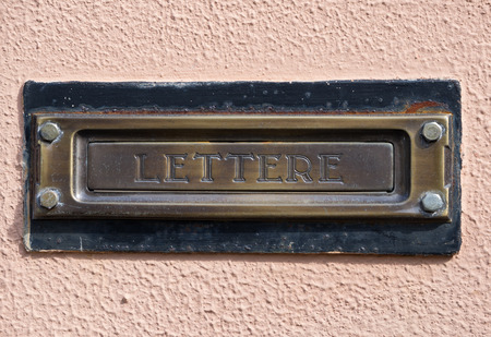 Typical Italian mailbox directly fixed on the wallの写真素材