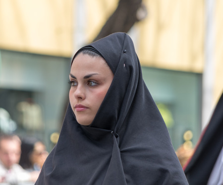 Cagliari, Sardinia, Italy - May 1, 2014: Girl with the typical Sardinian costumes During the festival of Saint Efisio. Cagliari, Sardinia, Italy.のeditorial素材
