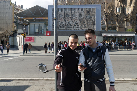 Barcellona, Spain, March 3, 2015: Tourists visit the Sagrada Familia by Antoni Gaudiのeditorial素材