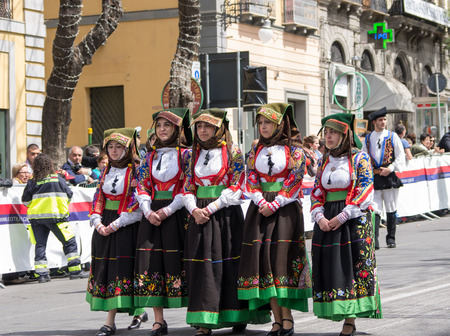 Cagliari, Sardinia, Italy - May 1, 2014: Girl with the Sardinian typical costumes during the festival of Saint Efisio. Cagliari, Sardinia, Italy.のeditorial素材