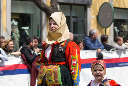 Cagliari, Sardinia, Italy - May 1, 2014: Girl with the Sardinian typical costumes during the festival of Saint Efisio. Cagliari, Sardinia, Italy.のeditorial素材