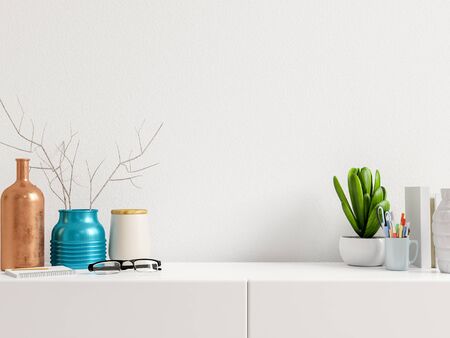 Modern workplace with creative desk with plants have white wall,3d renderingの写真素材
