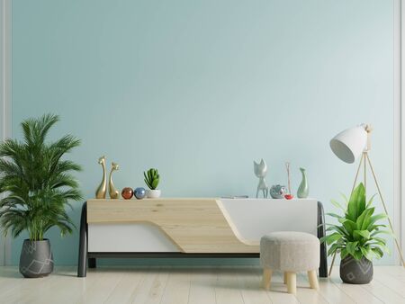 Cabinet mockup in modern empty room,blue wall, 3d renderingの写真素材