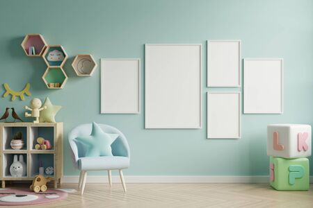 Mock up poster frame in children room,kids room,nursery mockup,blue wall,3d renderingの写真素材