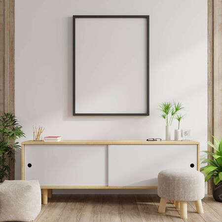 Mock up poster frame on cabinet in interior.3d renderingの写真素材