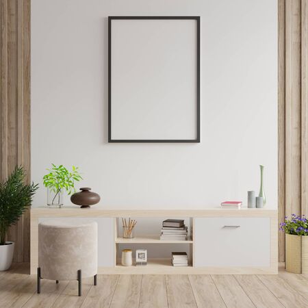 Mock up poster frame on cabinet in interior.3d renderingの写真素材