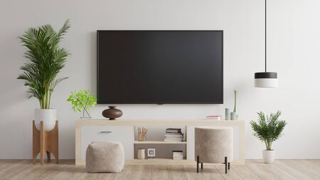 TV on wall and cabinet, living room.3d renderingの写真素材