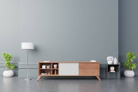 Tv cabinet in modern empty room on back dark wall background, 3d renderingの写真素材