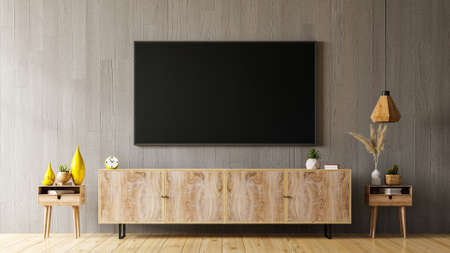 Tv on cabinet the in modern living room the concrete wall,3d renderingの写真素材