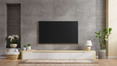 TV wall mount on cabinet the in modern living room the concrete wall,3d renderingの写真素材