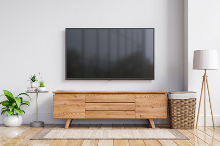 TV on the cabinet in modern living room on white wall background,3d renderingの写真素材