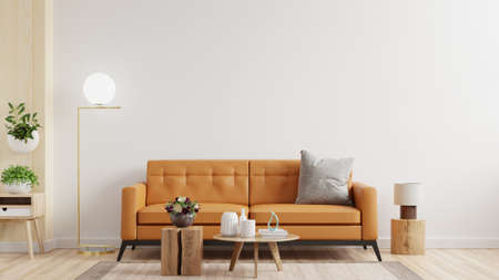 Living room interior wall mockup in warm tones with leather sofa on white wall background.3d renderingの写真素材