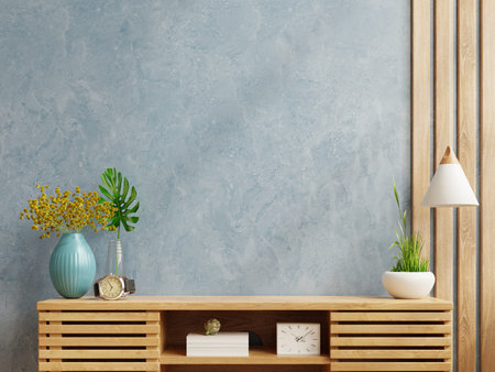 Blue wall mockup in modern empty room on wooden cabinet.3D rendering