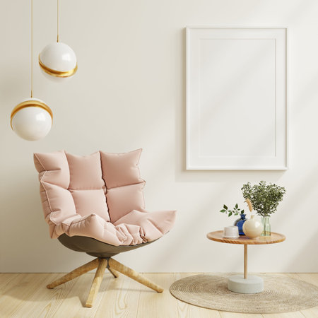 Poster mockup with vertical frames on empty white wall in living room interior with pink velvet...