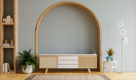 Wood cabinet for TV LED in an empty living room interior with dark blue wall.3D renderingの写真素材