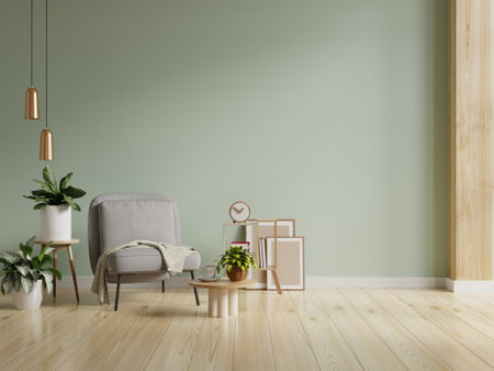 Gray armchair with table on light green wall and wooden flooring.3d renderingの写真素材