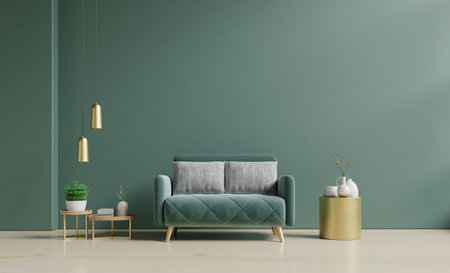 Modern minimalist interior with a green sofa on empty dark green wall.3d renderingの写真素材
