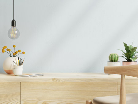 Office room with table working on light blue wall background.3d renderingの写真素材