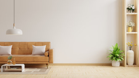 Living room wall mock up with leather sofa and decor on white background.3d renderingの写真素材