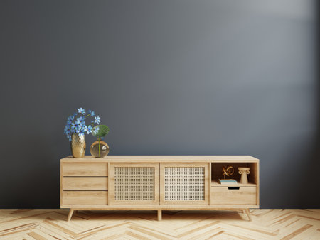 Cabinet for TV in living room on dark blue wall.3d renderingの写真素材