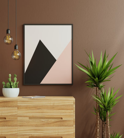 Mock up poster frame in modern interior on dark brown wall background.3d renderingの写真素材