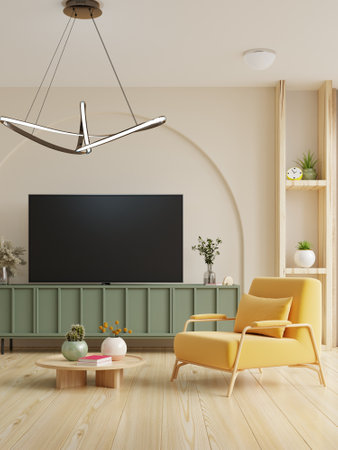 Mockup TV room interior with yellow armchair on empty cream color wall background.3d renderingの写真素材