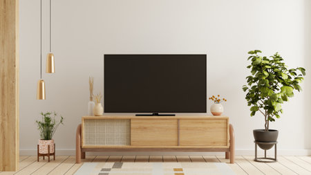 Living room with a white wall background, enhanced by the presence of a beautifully mounted TV. 3d renderingの写真素材