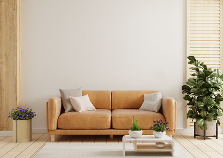 Modern living room wall mockup with leather sofa and decor on white background.3d renderingの写真素材