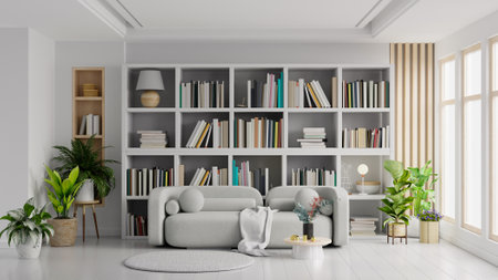 Library in the living room with gray sofa on empty light white color wall.3d renderingの写真素材