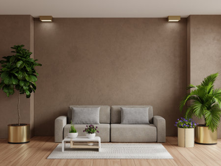 Living room interior wall mockup in warm tones with sofa on empty wall background.3d renderingの写真素材