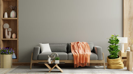 Cozy living room with grey sofa on dark wall and wooden flooring.3d renderingの写真素材
