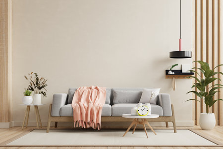 Living room interior background with grey sofa on cream color wall and wooden flooring- 3D renderingの写真素材