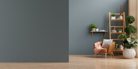 Mockup dark blue wall of living room with leather armchair on wood flooring- 3D renderingの写真素材
