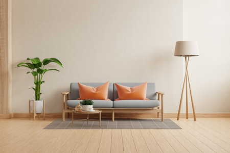 Modern minimalist interior with gray sofa on empty cream color wall background- 3D renderingの写真素材