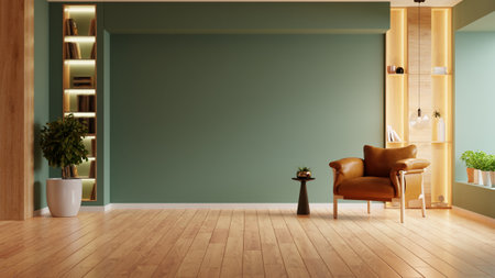 Large empty room with a leather armchair and a potted plant on dark green wall- 3D renderingの写真素材