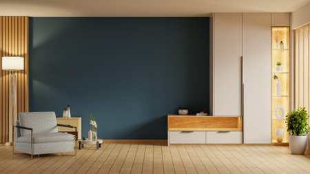 Living room with a blue wall and a white cabinet. A chair is in the room. A potted plant is on the...