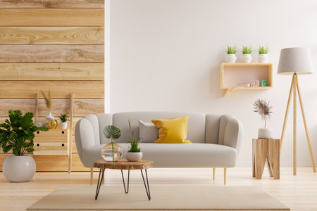 Bright and cozy living room interior featuring a light gray sofa with yellow and gray cushions, a round wooden coffee table, and decorative plants- 3D renderingの写真素材