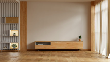 Minimalist interior design of a modern living room with empty beige wall, a wooden TV cabinet, shelves, and wood parquet flooring, ready for decoration or product placement- 3D renderingの写真素材