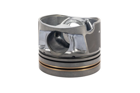 Close-up of spare new piston for a gasoline engine with on an isolated white background.の写真素材
