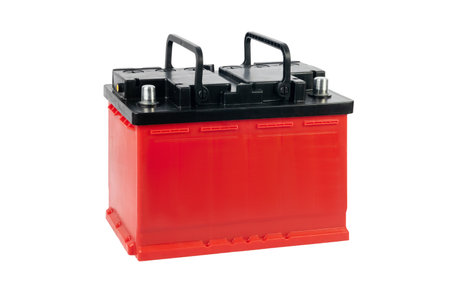 Red car battery on white background. isolateの写真素材