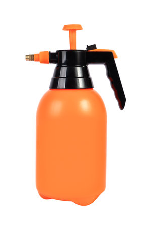 Pressure Hand garden sprayer for plants on a white background with orange pump, white backgroundの写真素材