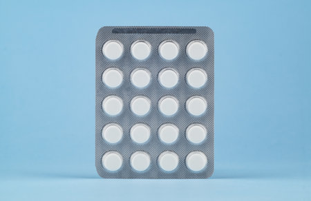 Blister of tablets on a light blue background.の写真素材