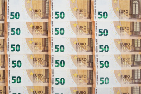 Euro banknotes of 50 euro as a background.
