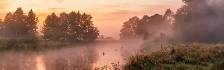 Foggy river in the morning. Panoramaの写真素材
