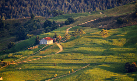 September rural scene in Carpathian mountains. Authentic village and fenceの写真素材