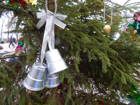 Silver bells on Christmas treeの写真素材