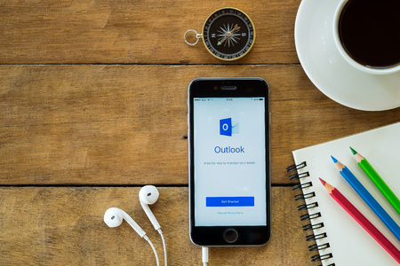 CHIANG MAI,THAILAND - MAY 20,2016 : Iphone 6s open Outlook application. Outlook is used for emails and also personal management of information.のeditorial素材