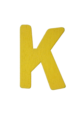 Yellow wooden letter K isolated on white background with clipping path.の写真素材