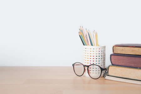 Back to school background with books, pencil and ruler on white backgrounds with copy space.の写真素材