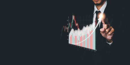 Businessman hand holding light bulbs and new ideas of business with innovative technology network connection.の写真素材